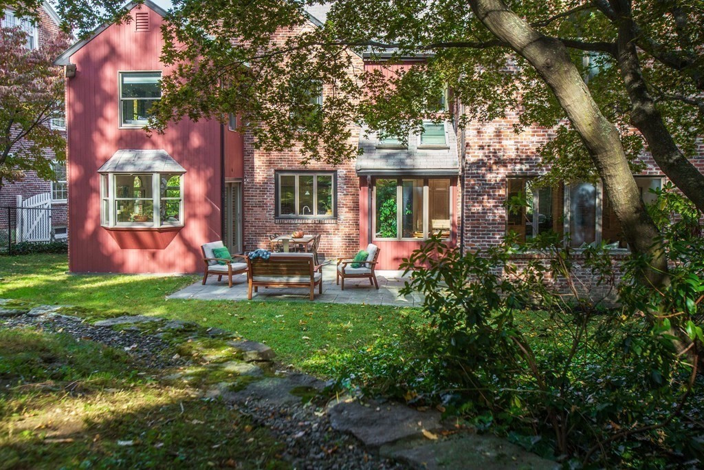 122 Clark Road Brookline, MA 02445 - Photo 39 of 40 a backyard of a house with outdoor seating