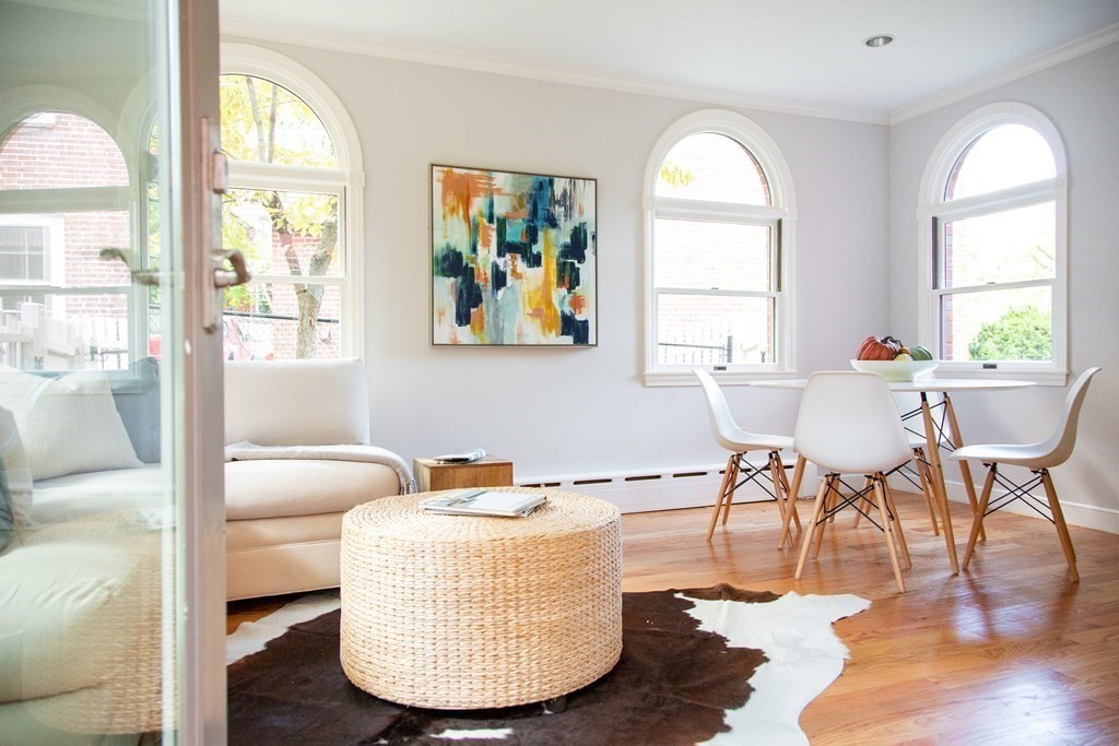 122 Clark Road Brookline, MA 02445 - Photo 5 of 40 a living room with furniture and a large window
