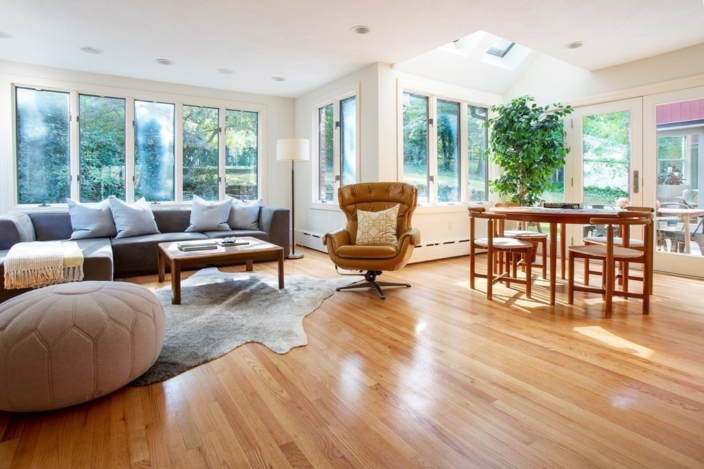 122 Clark Road Brookline, MA 02445 - Photo 10 of 40 a living room with furniture and a large window