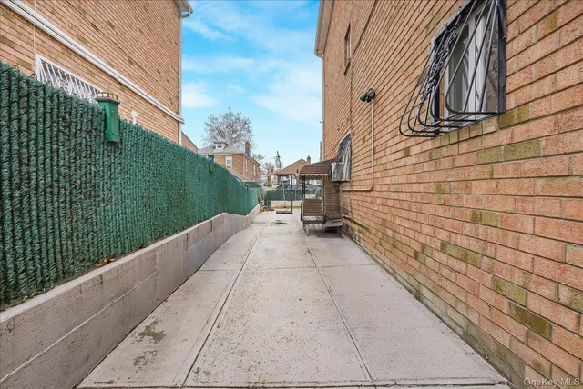 a view of a pathway both side of building