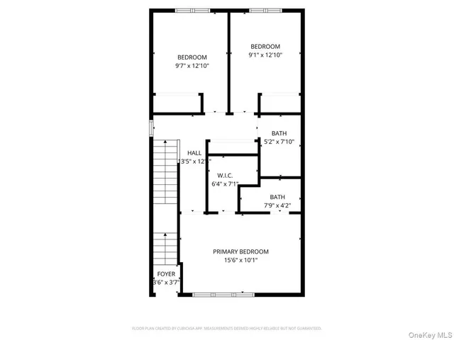 a view of a hallway with wooden floor and entryway