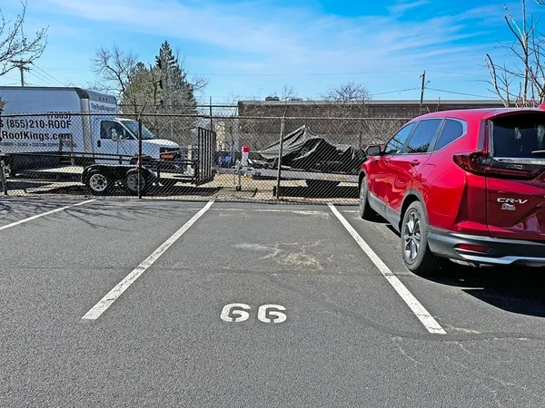 a view of a cars parking space