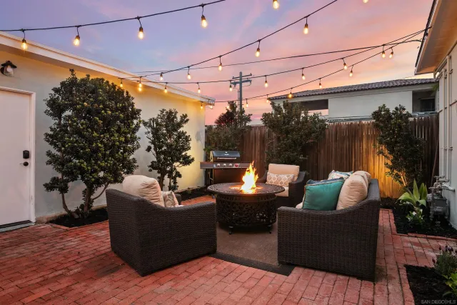 a outdoor living space with patio furniture and a potted plant
