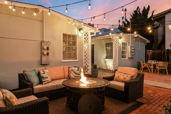 a outdoor living space with furniture and a potted plant