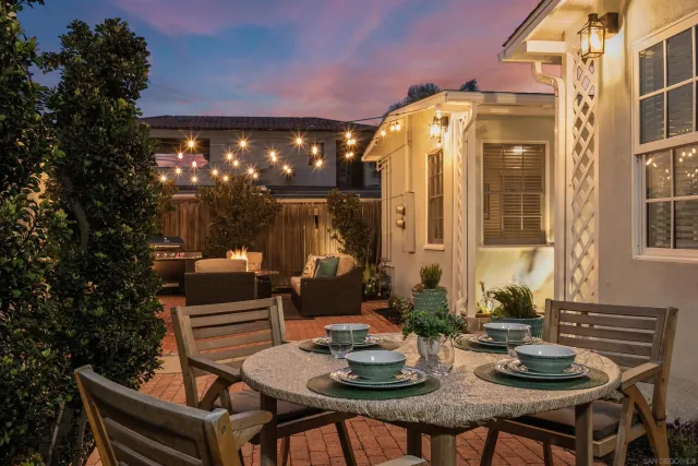 a front view of house with outdoor seating