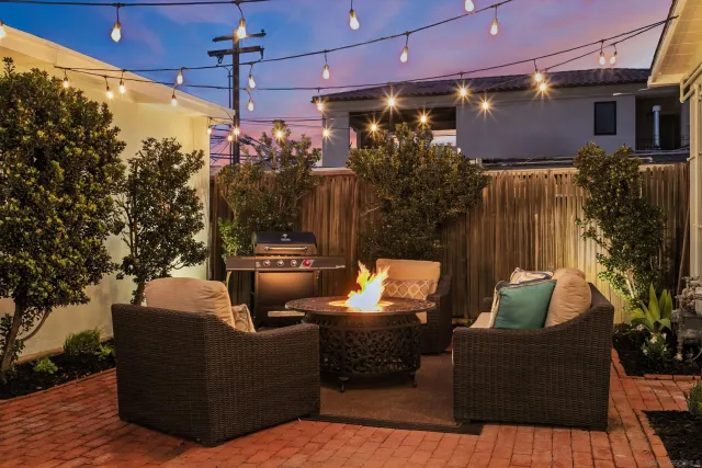 a outdoor living space with furniture and a potted plant