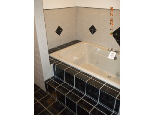 247 Rochester Road Northeast Poplar Grove, IL 61065 - Photo 6 of 7 a bathroom with a shower