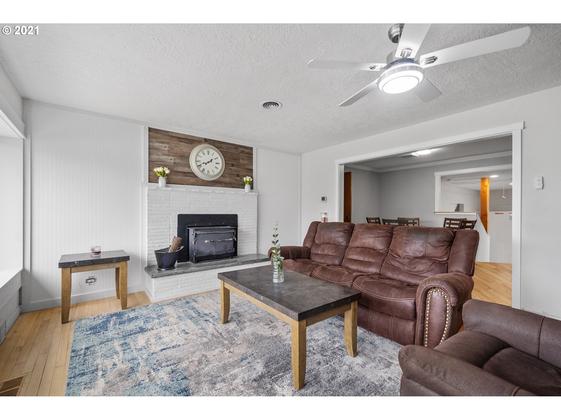1220 McCormick Loop Road Tillamook, OR 97141 - Photo 11 of 30 a living room with furniture and a fireplace