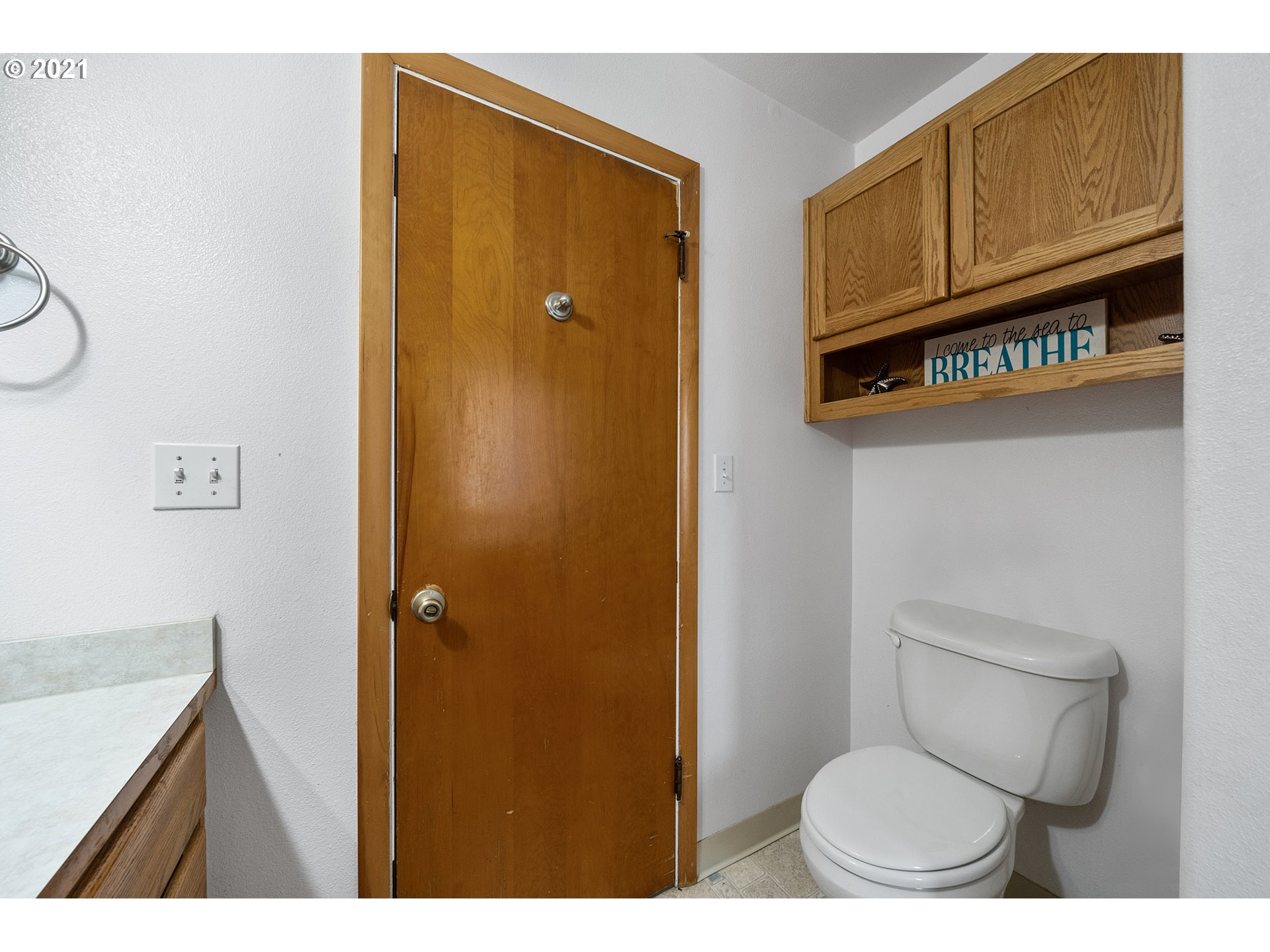 1220 McCormick Loop Road Tillamook, OR 97141 - Photo 29 of 30 a bathroom with a toilet and a sink