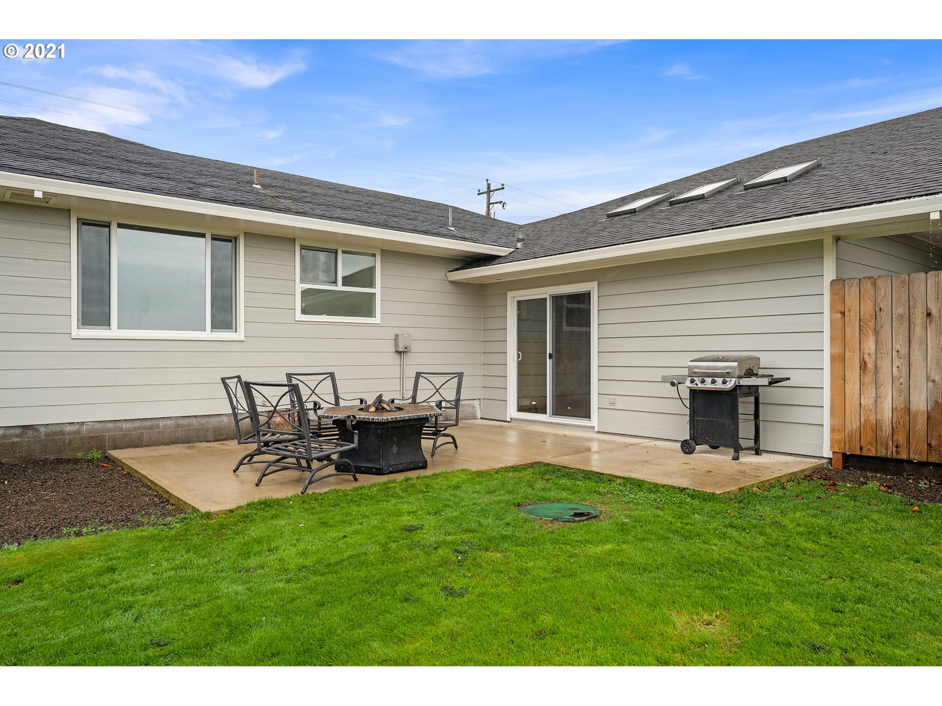 1220 McCormick Loop Road Tillamook, OR 97141 - Photo 7 of 30 a view of a backyard with table and chairs