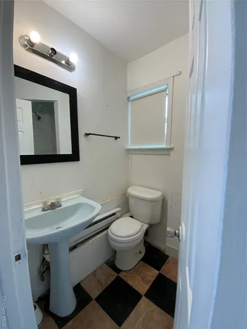 a bathroom with a sink and a shower