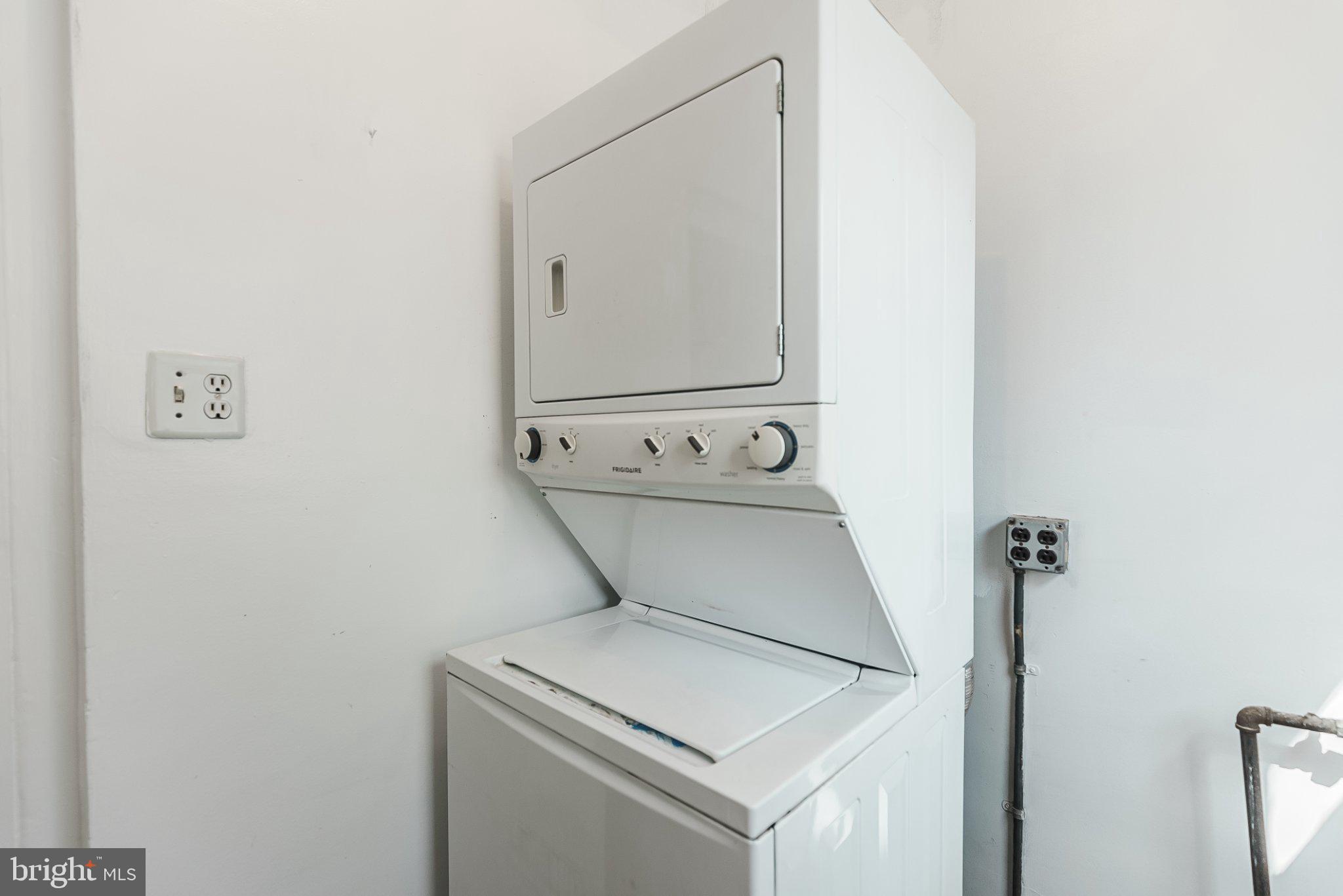 724 Moyer Street Philadelphia, PA 19125 - Photo 19 of 25 a close view of a utility room with dryer and washer