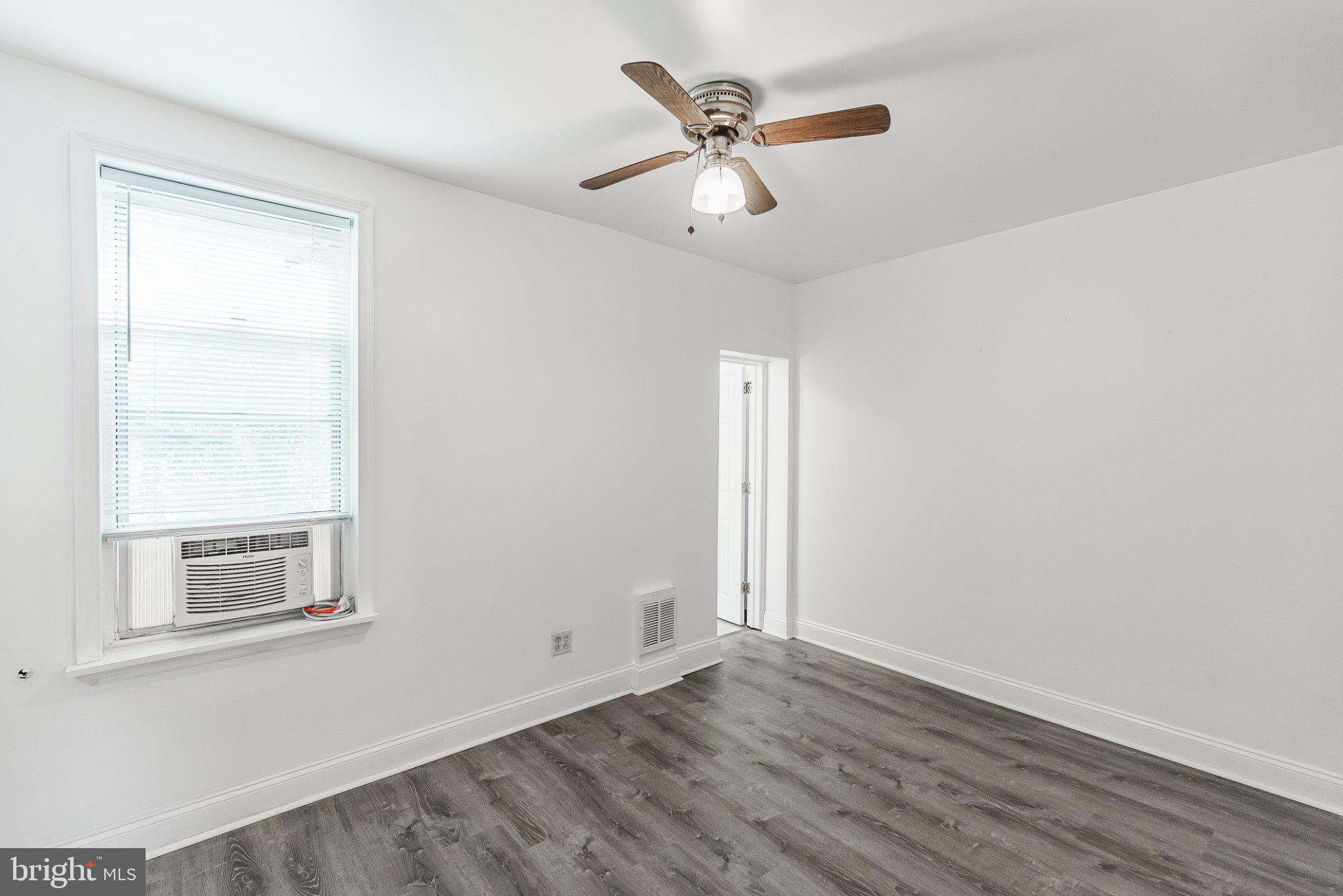 724 Moyer Street Philadelphia, PA 19125 - Photo 20 of 25 a view of empty room with wooden floor and fan