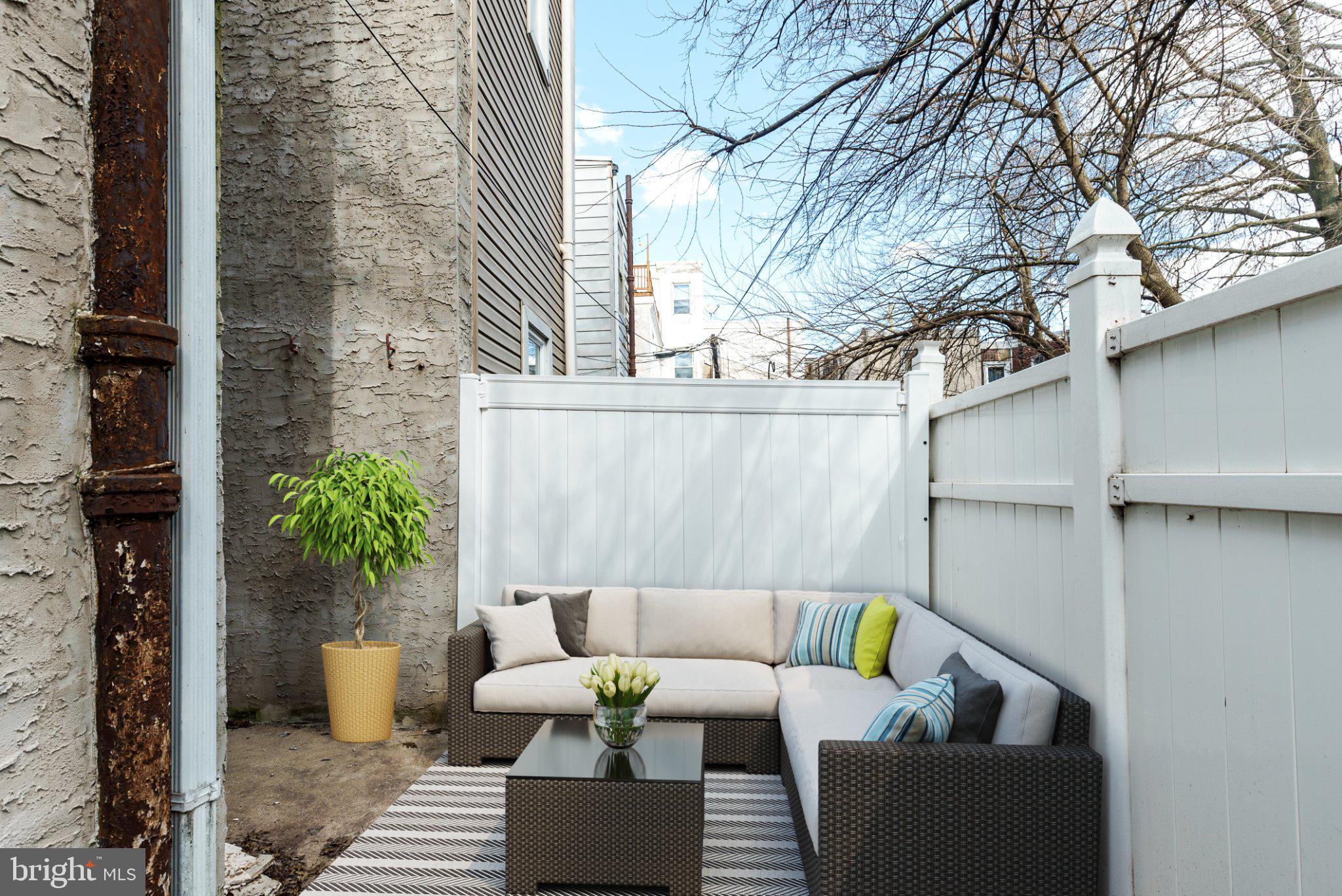 724 Moyer Street Philadelphia, PA 19125 - Photo 5 of 25 front view of a patio