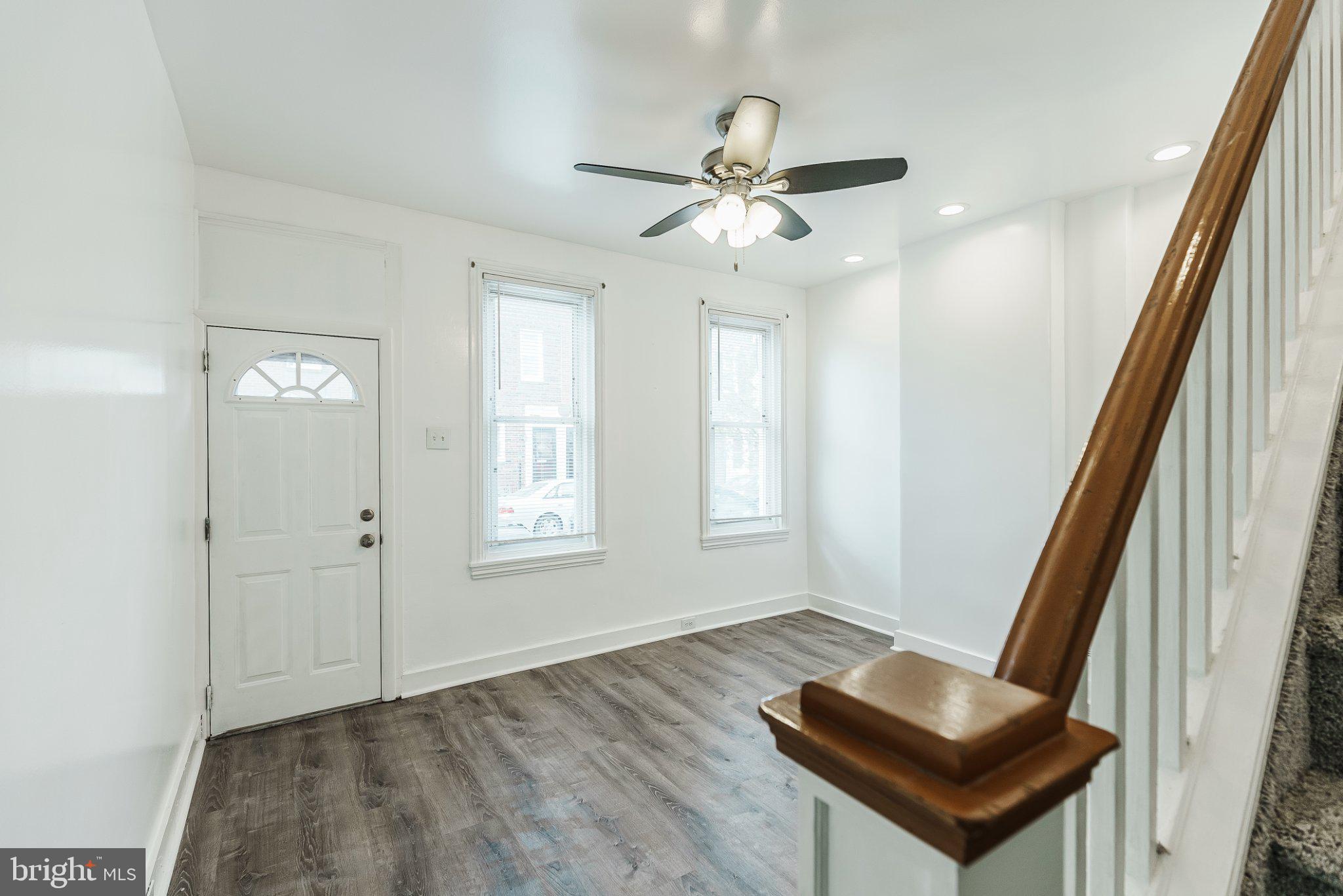 724 Moyer Street Philadelphia, PA 19125 - Photo 8 of 25 a living room with a bed furniture and a window