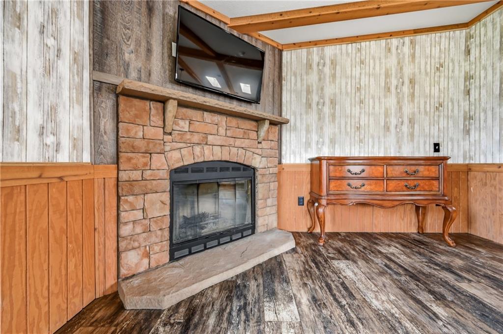 69 South Summit Road, Unit 409 Greenville, PA 16125 - Photo 14 of 41 a living room with furniture and a fireplace