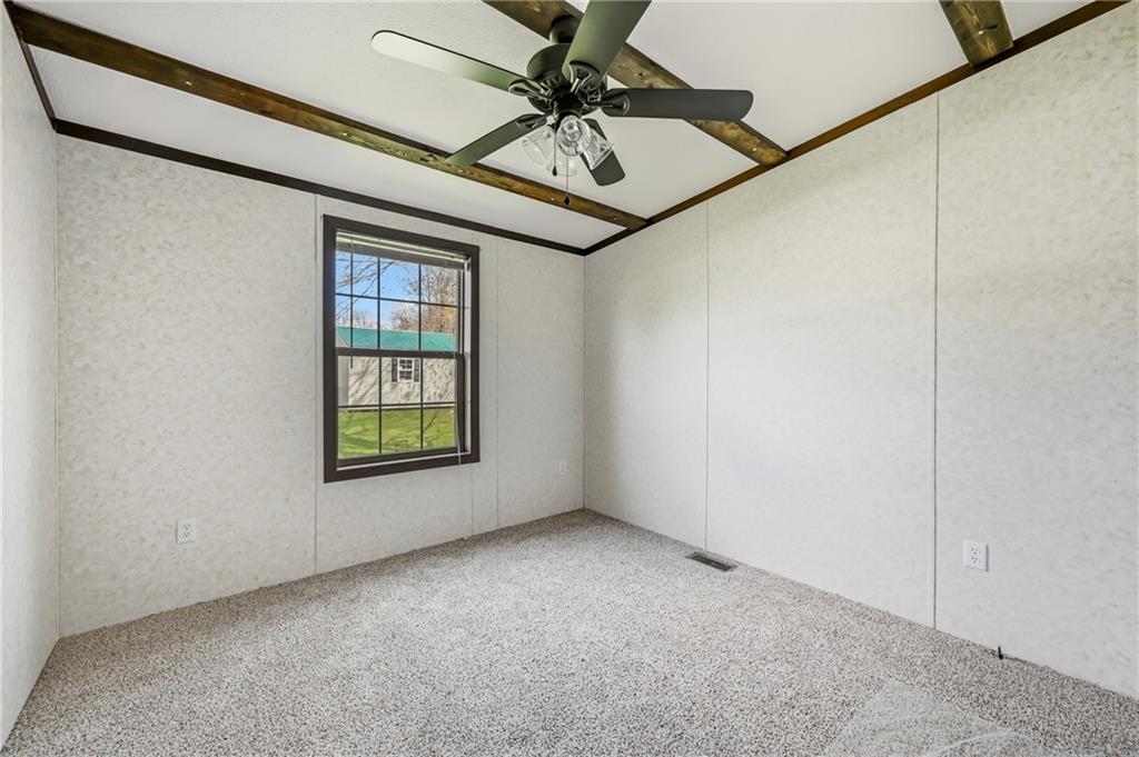 69 South Summit Road, Unit 409 Greenville, PA 16125 - Photo 17 of 41 a view of an empty room with a window