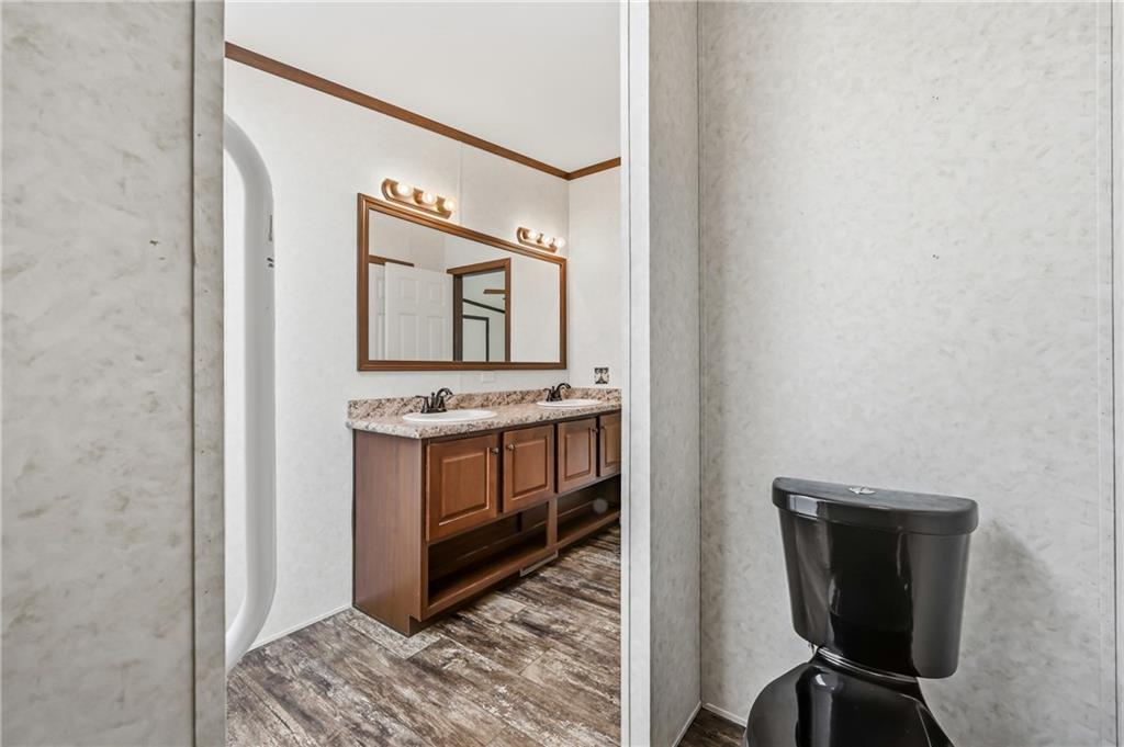 69 South Summit Road, Unit 409 Greenville, PA 16125 - Photo 24 of 41 a bathroom with a sink and a mirror