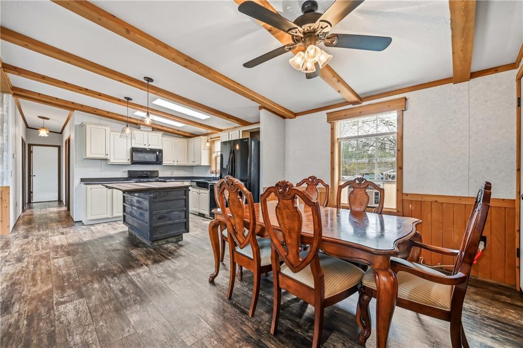 69 South Summit Road, Unit 409 Greenville, PA 16125 - Photo 6 of 41 a dining room with stainless steel appliances kitchen island granite countertop furniture and a kitchen view