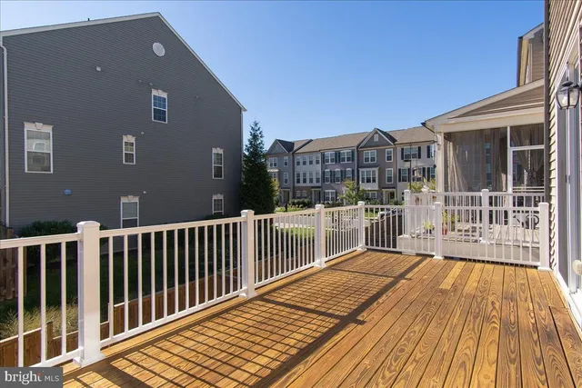 a view of a backyard with sitting area