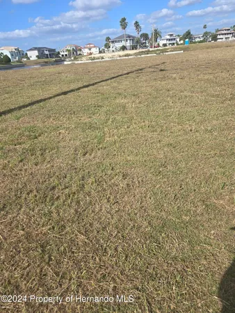 a view of an ocean and city