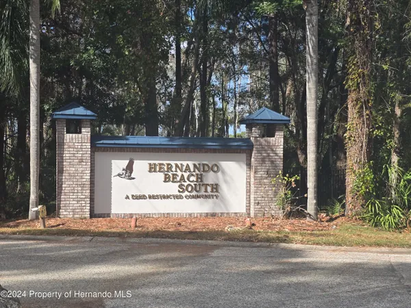 a sign that is on the side of the road