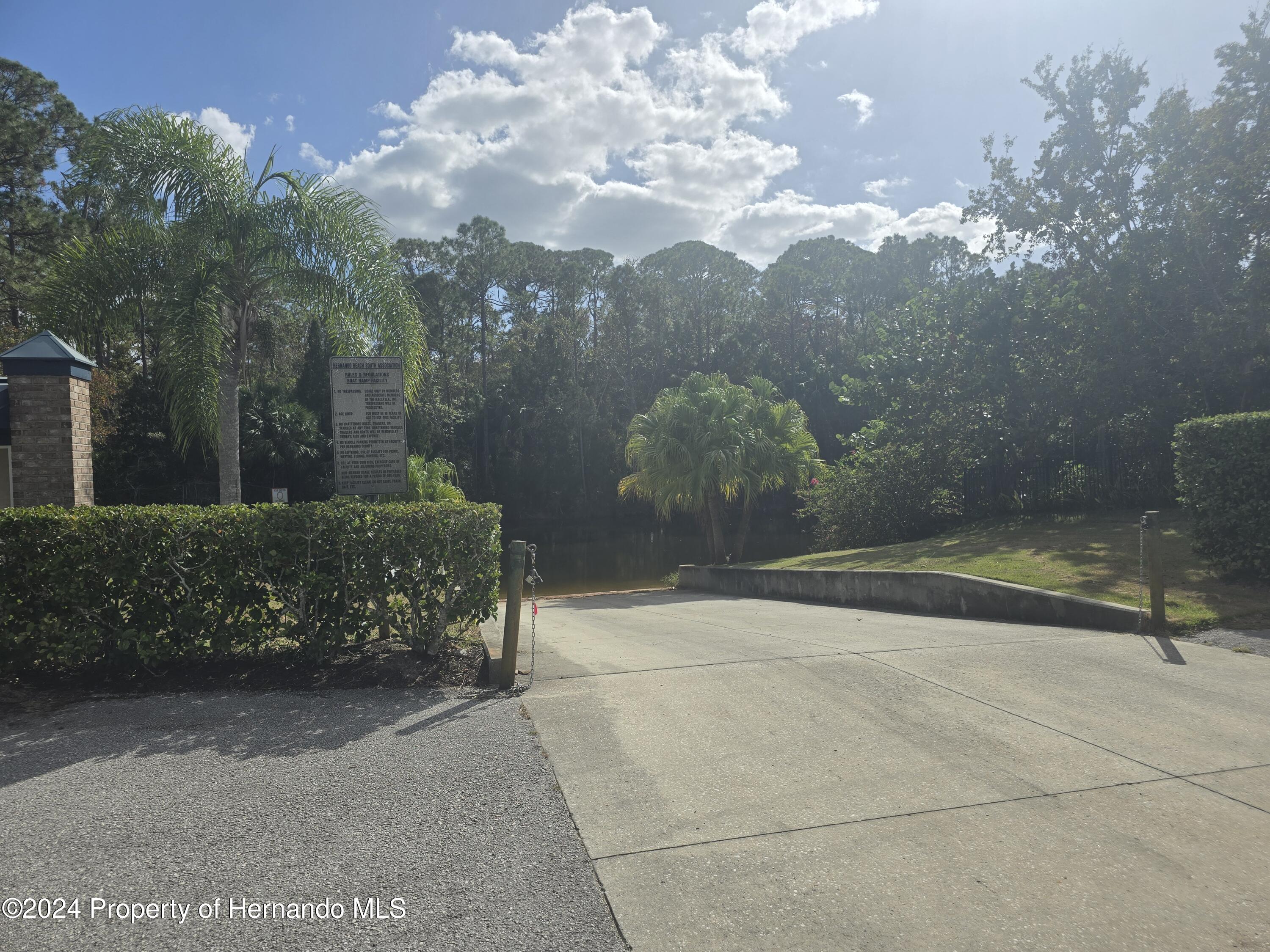 3415 Sheephead Drive Hernando Beach, FL 34607 - Photo 5 of 6 a view of a yard