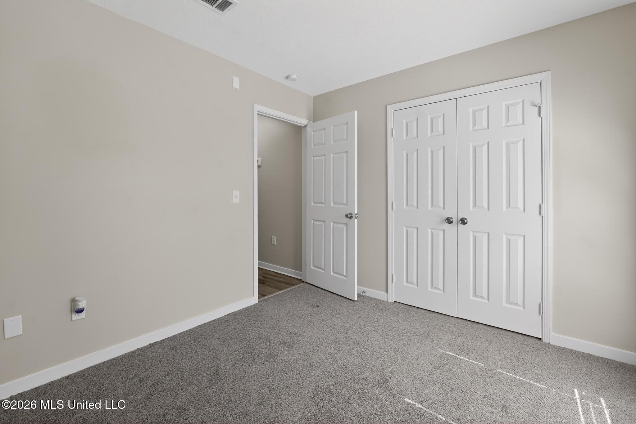 638 Oak Ridge Way Pearl, MS 39208 - Photo 15 of 20 14_638_Oak_Ridge_Wy-Bedroom-8161