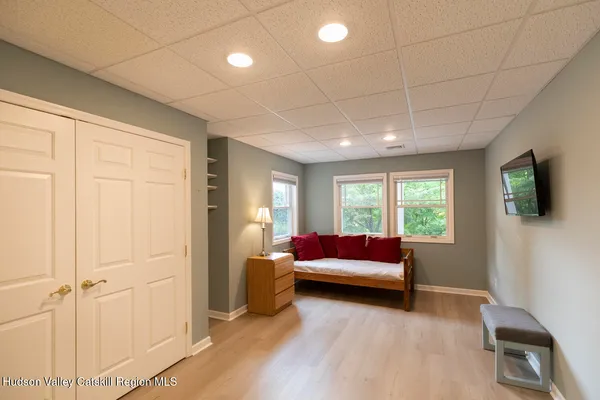 an aerial view of a house with yard outdoor and green space