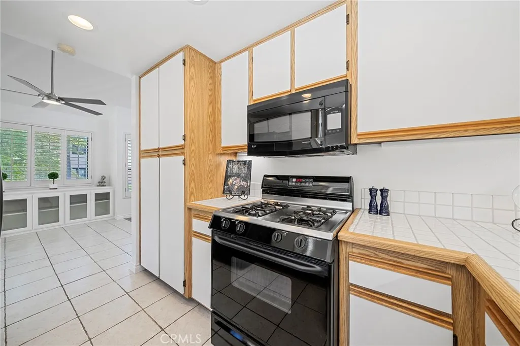 4277 Las Virgenes Road Calabasas, CA 91302 - Photo 11 of 28 Lots of cabinets and counter space in super clean kitchen.