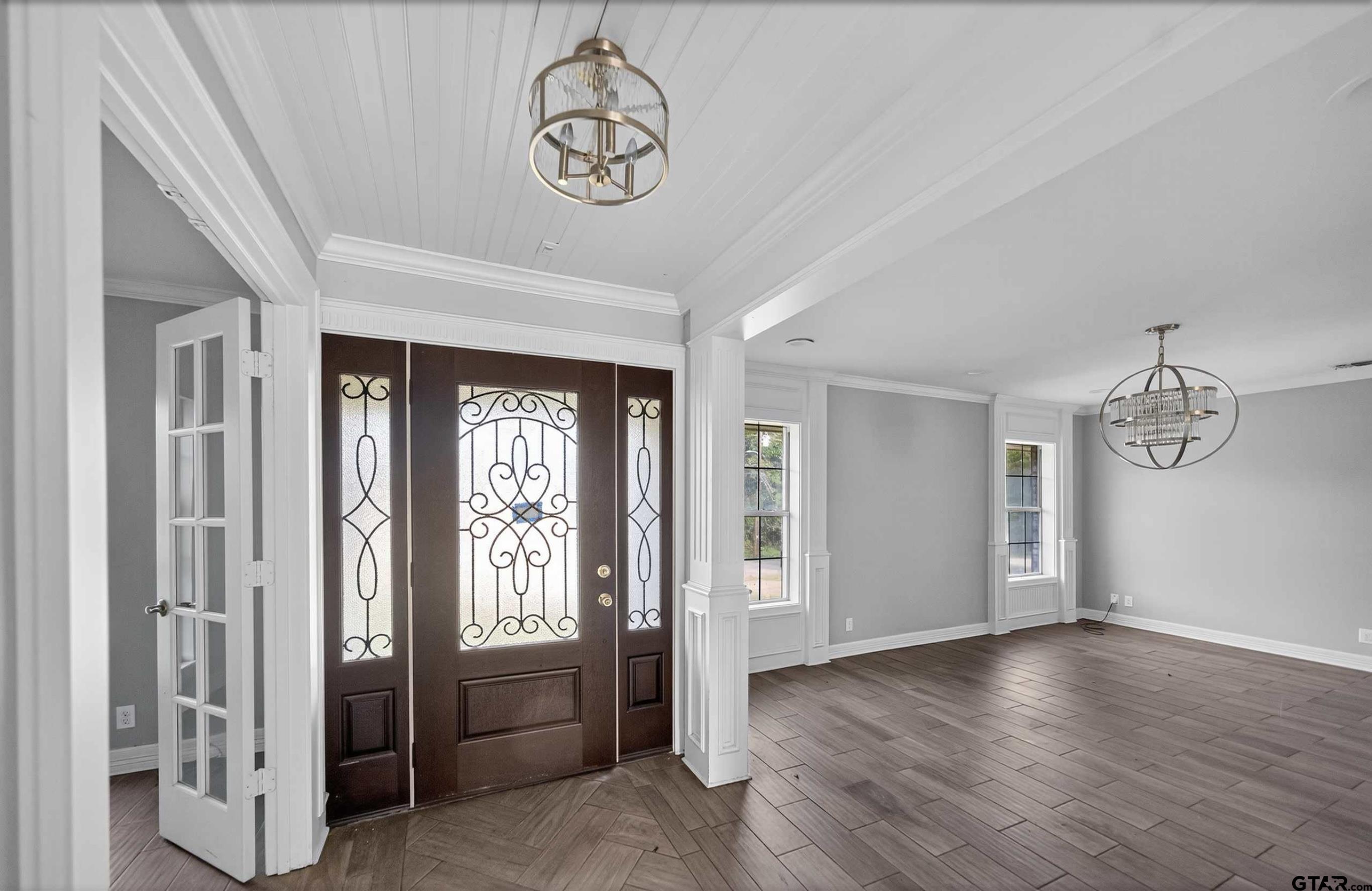 3408 Jackson Avenue Tyler, TX 75705 - Photo 8 of 45 a view of an entryway with a window