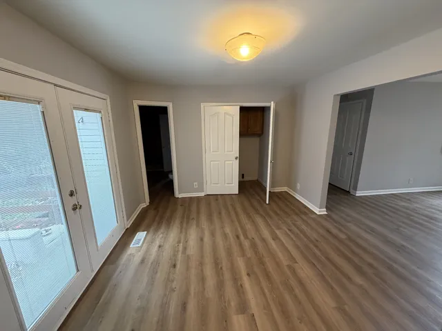 a kitchen with a refrigerator sink and stove