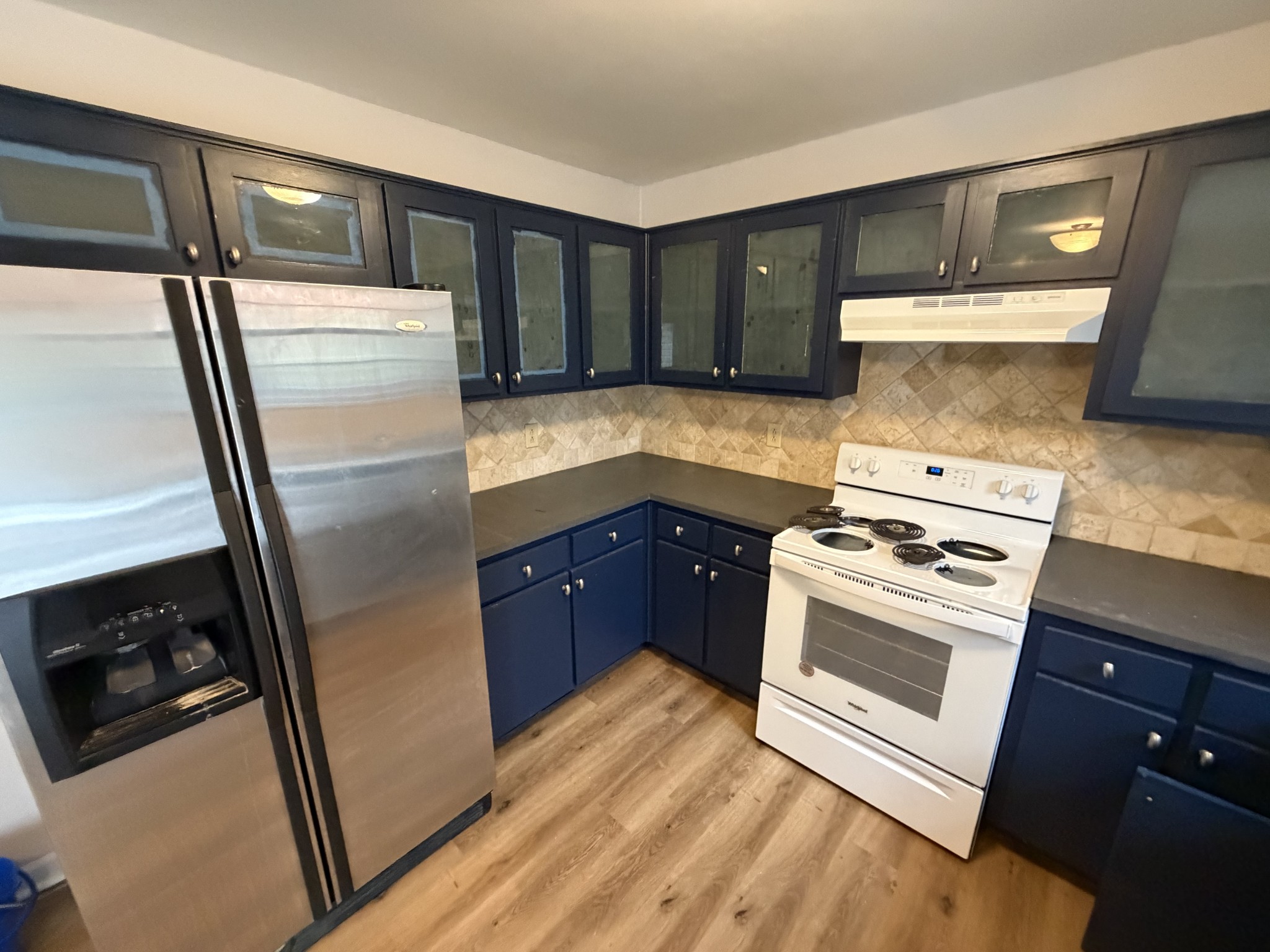 1102 Falling Tree Court Murfreesboro, TN 37130 - Photo 4 of 9 a kitchen with a refrigerator sink and stove