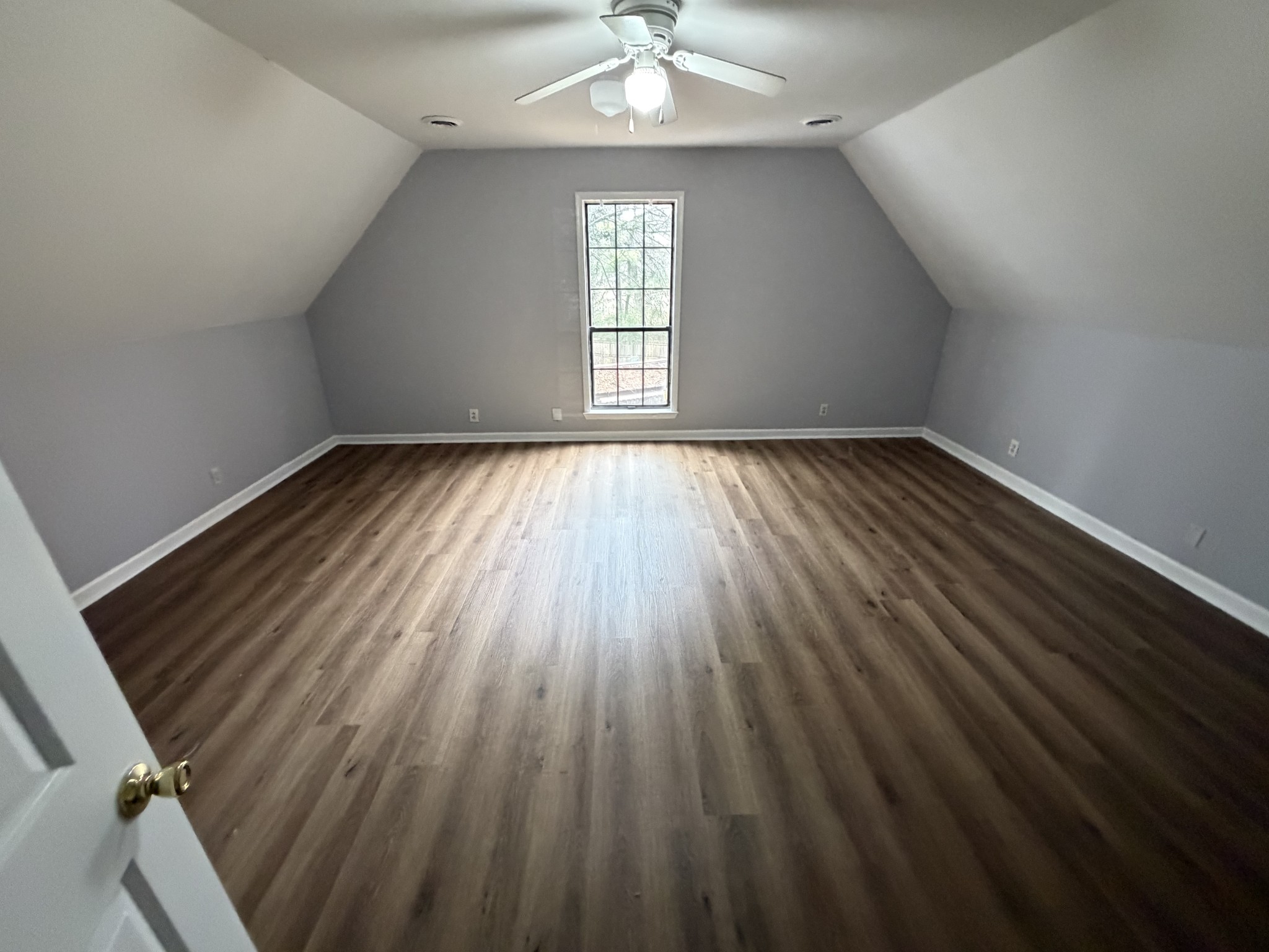 1102 Falling Tree Court Murfreesboro, TN 37130 - Photo 7 of 9 wooden floor in an empty room with a window