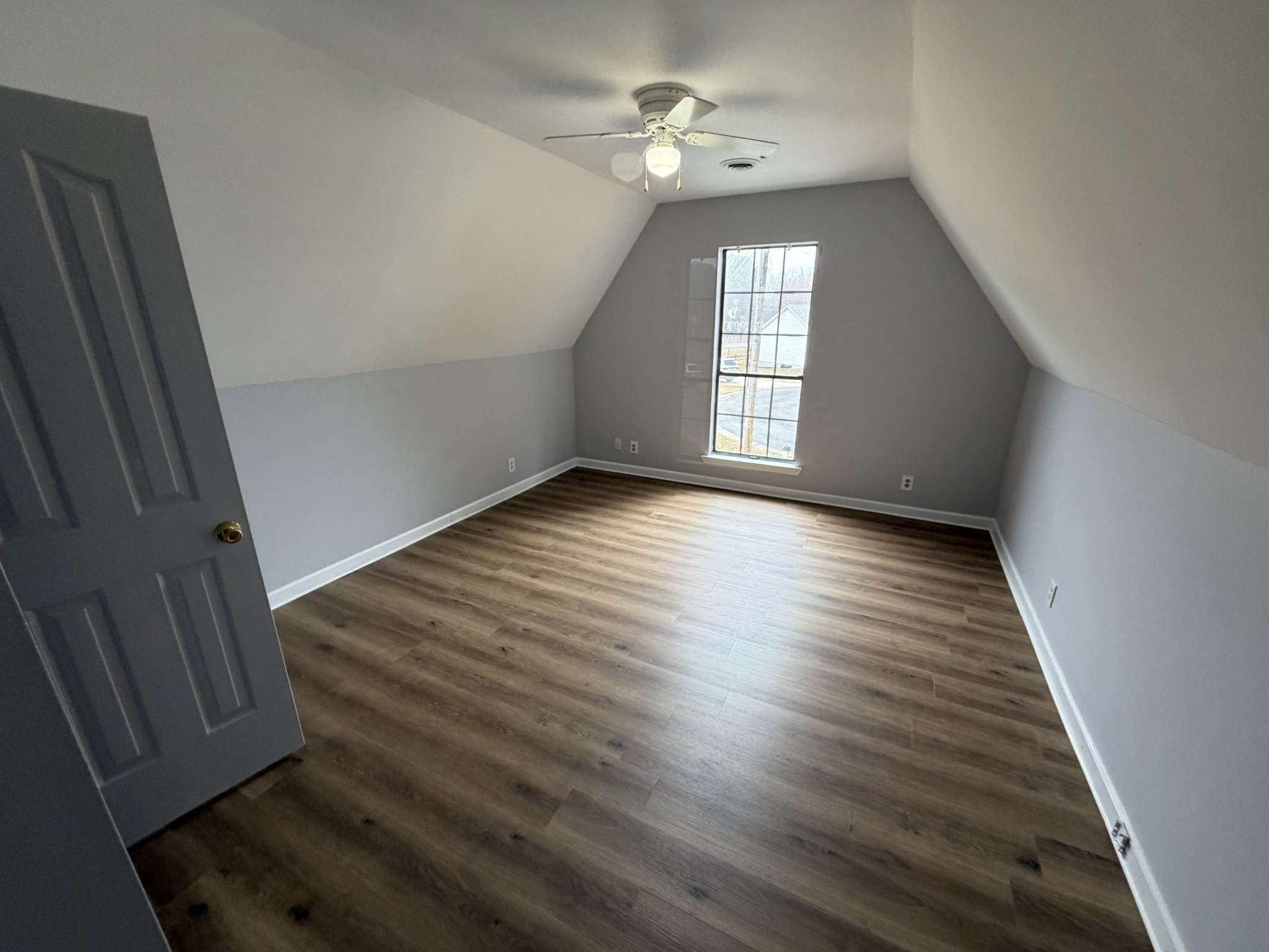 1102 Falling Tree Court Murfreesboro, TN 37130 - Photo 9 of 9 wooden floor in an empty room with a window