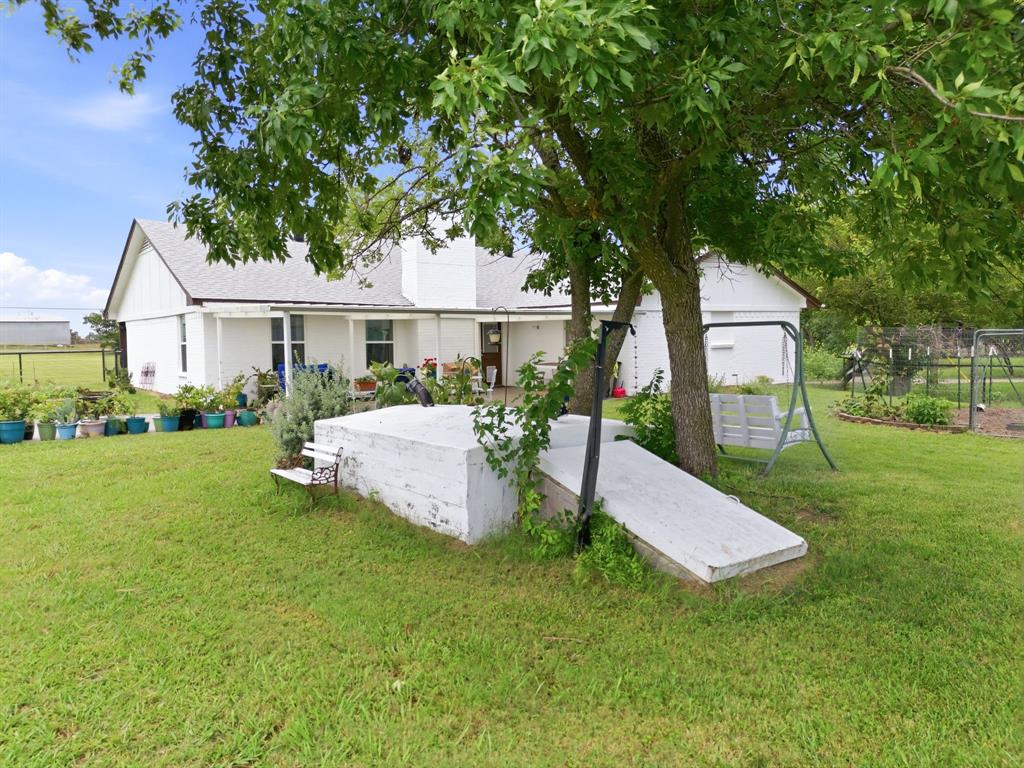 698 Hackberry Road Van Alstyne, TX 75495 - Photo 25 of 34 Storm Shelter