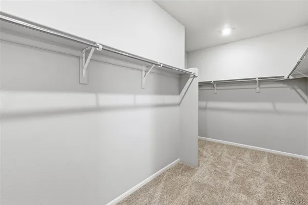 a view of a room with racks on the wall