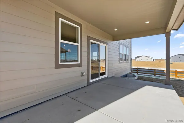 a view of a house with a patio