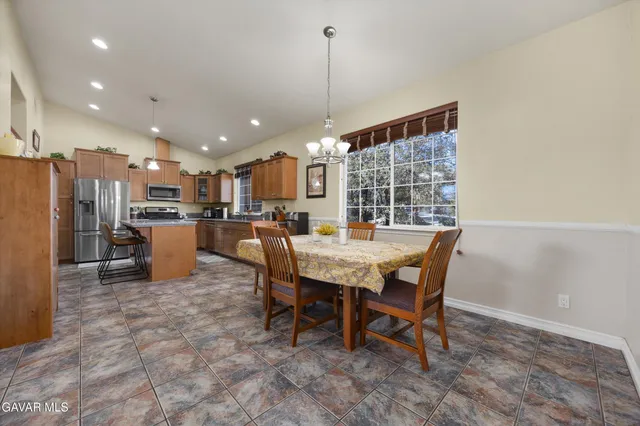 a view of balcony with furniture