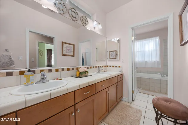 a view of a storage & utility room with closet dryer