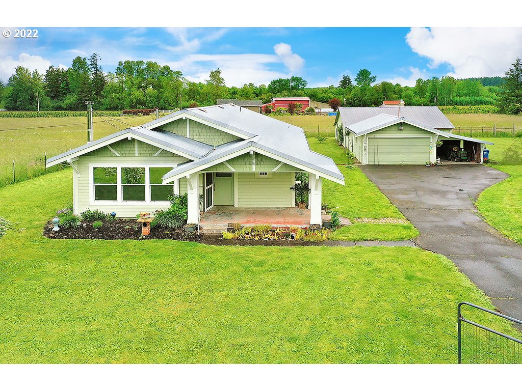 121 Rarey Road Winlock, WA 98596 - Photo 1 of 32 a aerial view of a house with a yard
