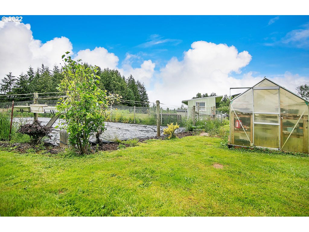 121 Rarey Road Winlock, WA 98596 - Photo 28 of 32 a view of a house with a yard