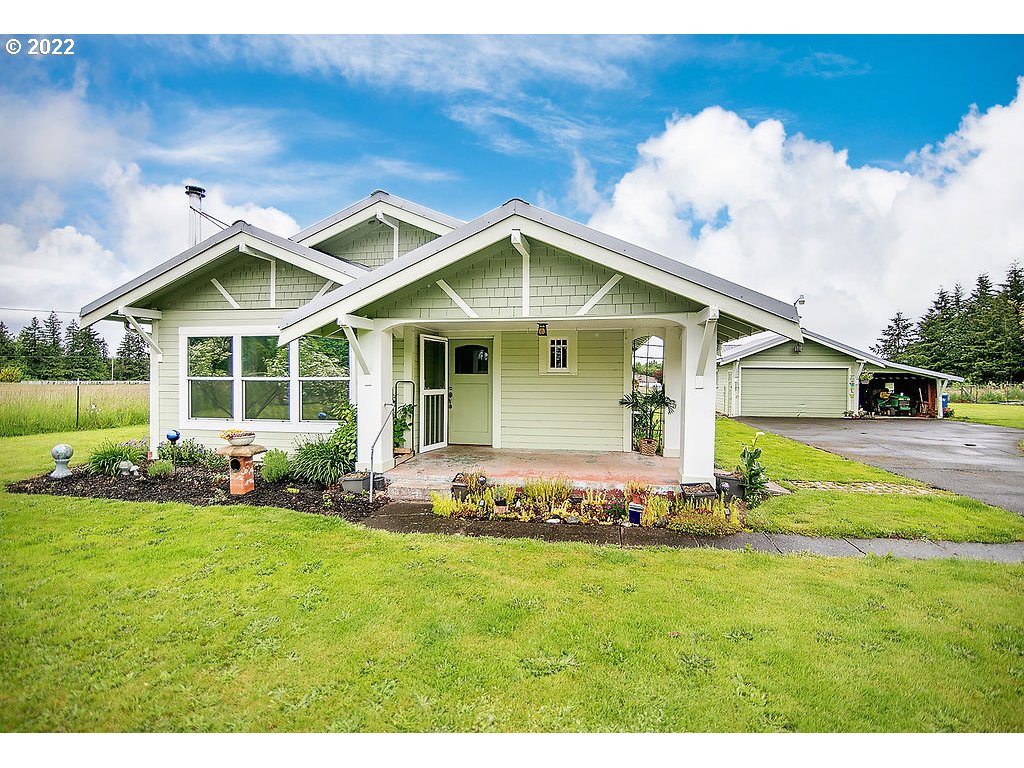 121 Rarey Road Winlock, WA 98596 - Photo 32 of 32 a front view of a house with a garden
