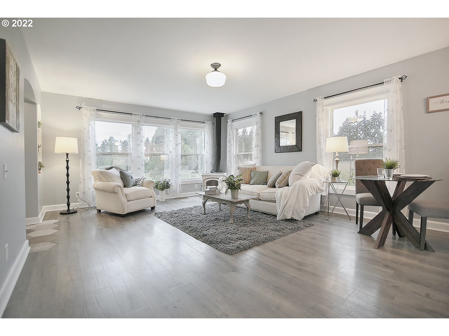 121 Rarey Road Winlock, WA 98596 - Photo 5 of 32 a living room with furniture and a wooden floor