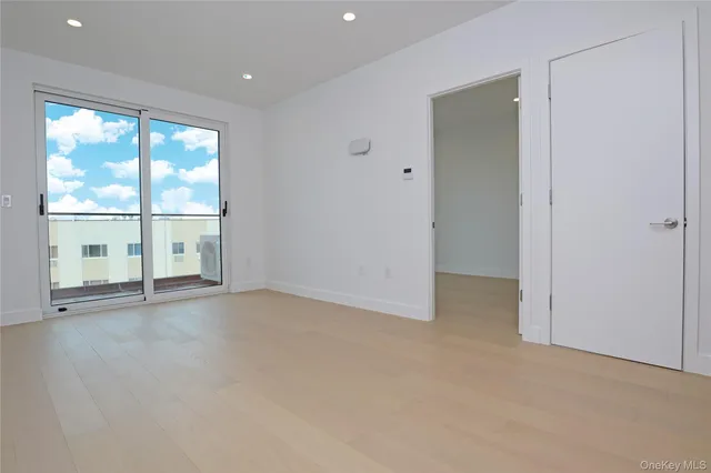 a kitchen with a washer and dryer