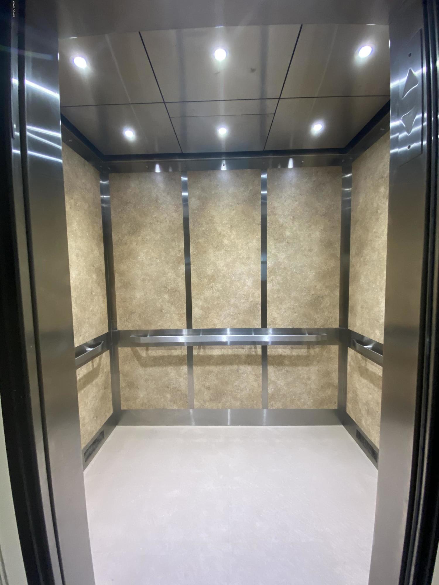 915 Ocean Shore Boulevard, Unit 4030 Ormond Beach, FL 32176 - Photo 4 of 37 Elegant Elevators