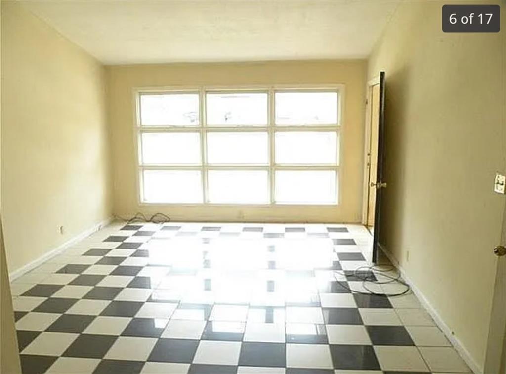2041 Olive Springs Road Southeast Marietta, GA 30060 - Photo 5 of 6 a bathroom with a black and white checkered floor