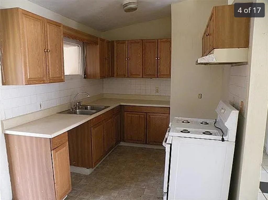 2041 Olive Springs Road Southeast Marietta, GA 30060 - Photo 6 of 6 a utility room with sink dryer and washer