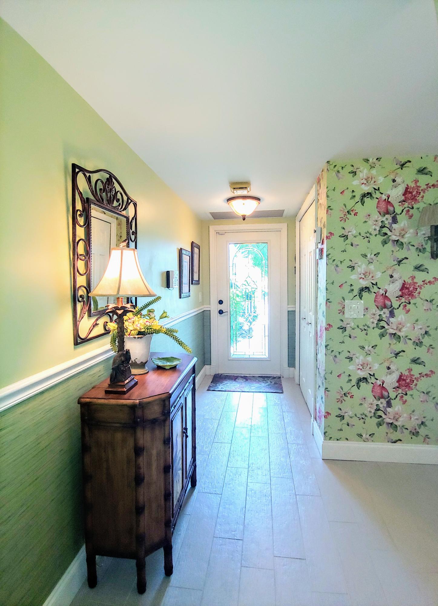 3845 North Quail Ridge Drive Boynton Beach, FL 33436 - Photo 2 of 23 Entry hallway