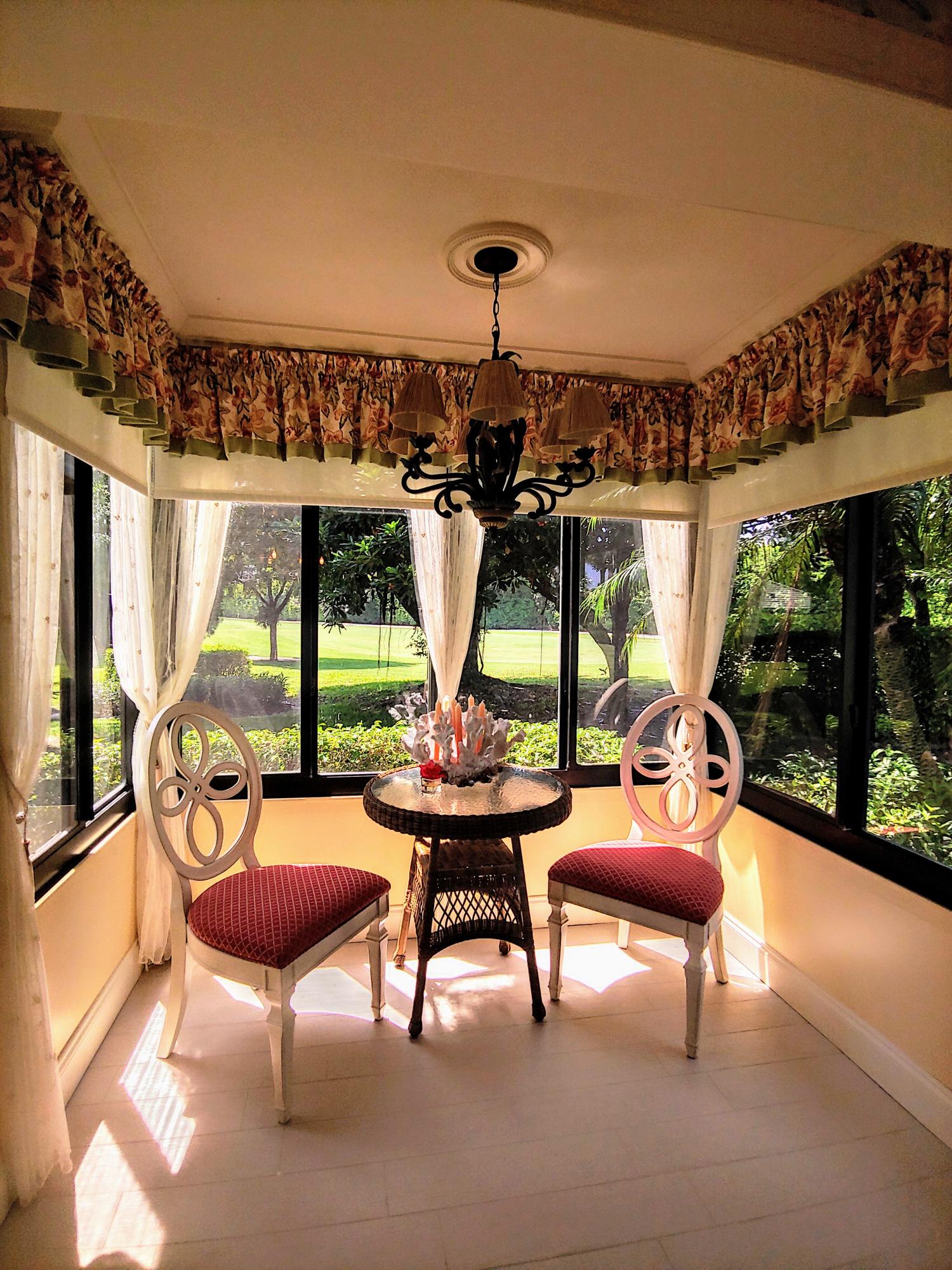 3845 North Quail Ridge Drive Boynton Beach, FL 33436 - Photo 10 of 23 Enclosed porch off kitchen